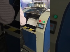 เครื่องเย็บหนังสือเข้าเล่มอัตโนมัติ ชนิดปรับศูนย์กลางการร้อยด้าย